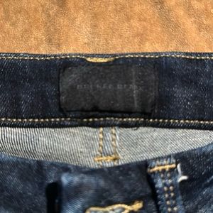 Buckle black low rise skinny jeans 26x30